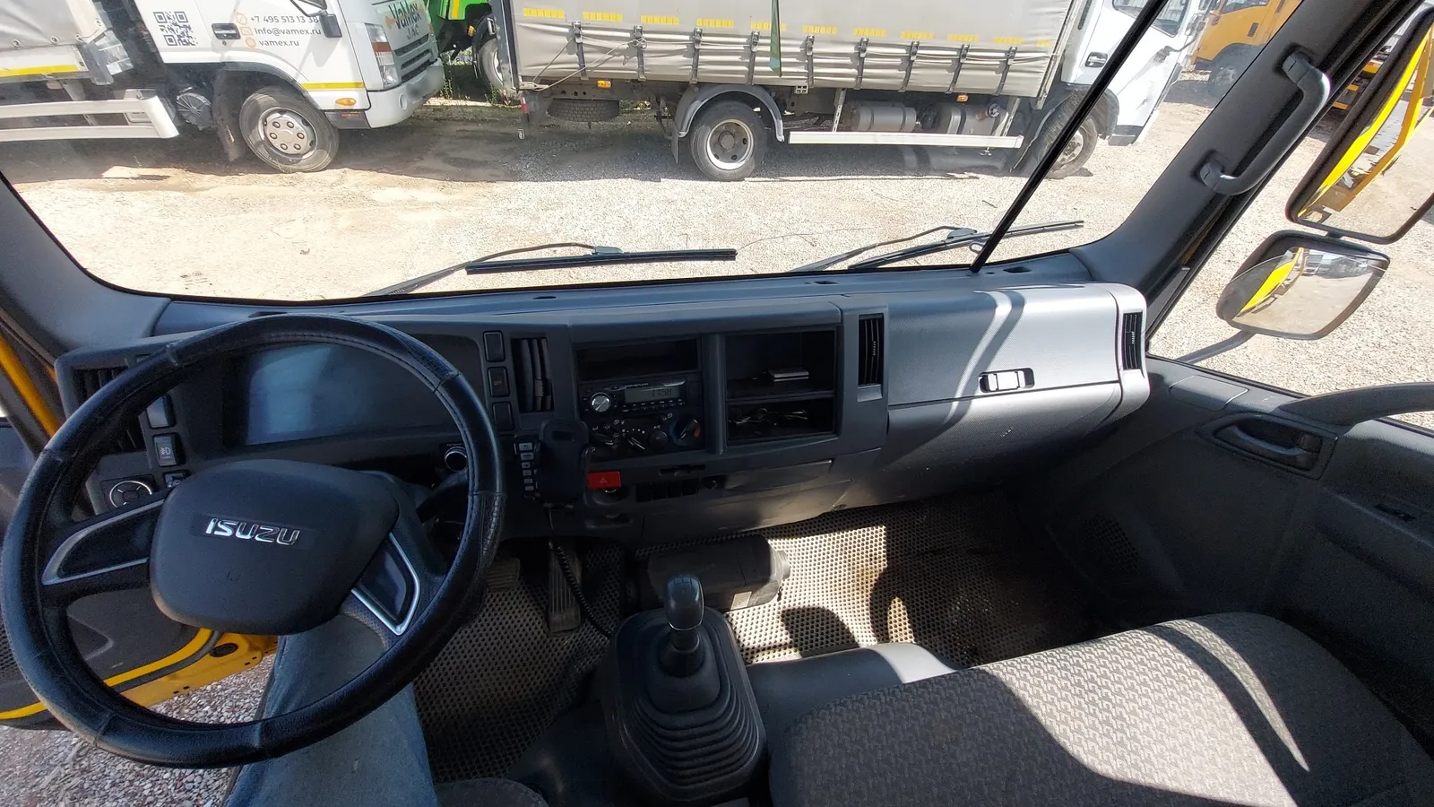 ISUZU ELF 12 (NQR) 4x2 Эвакуатор, фото 5