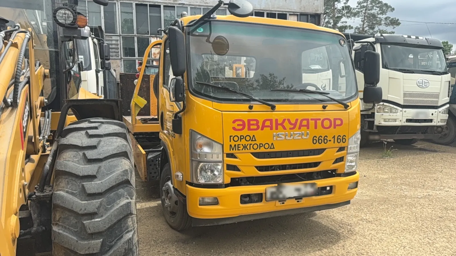ISUZU ELF 10.5 4x2 Эвакуатор, фото 2